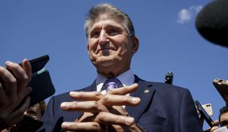 In this file photo, Sen. Joe Manchin, D-W.Va., a centrist Democrat vital to the fate of President Joe Biden&#39;s $3.5 government overhaul, updates reporters about his position on the bill, at the Capitol in Washington, Thursday, Sept. 30, 2021. Despite months of being courted and cajoled, Sen. Joe Manchin is still not a yes on President Joe Biden&#39;s big $2 trillion domestic package and has thrown Democrats into turmoil. (AP Photo/J. Scott Applewhite, File)  **FILE**