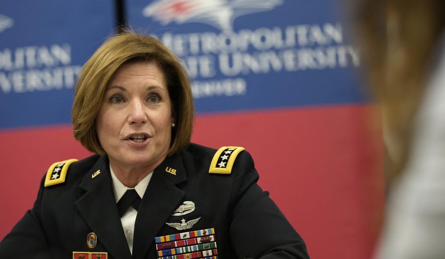 U.S. Army General Laura Richardson responds to questions from reporters before the Colorado native speaks at the fall commencement ceremony of her alma mater, Metropolitan State University of Denver, Friday, Dec. 17, 2021, in Denver. Richardson, who grew up in Lone Tree, Colo., started her military career as an Army aviator before rising to the level of a four-star general who was recently named commander of the U.S. Southern Command. (AP Photo/David Zalubowski)