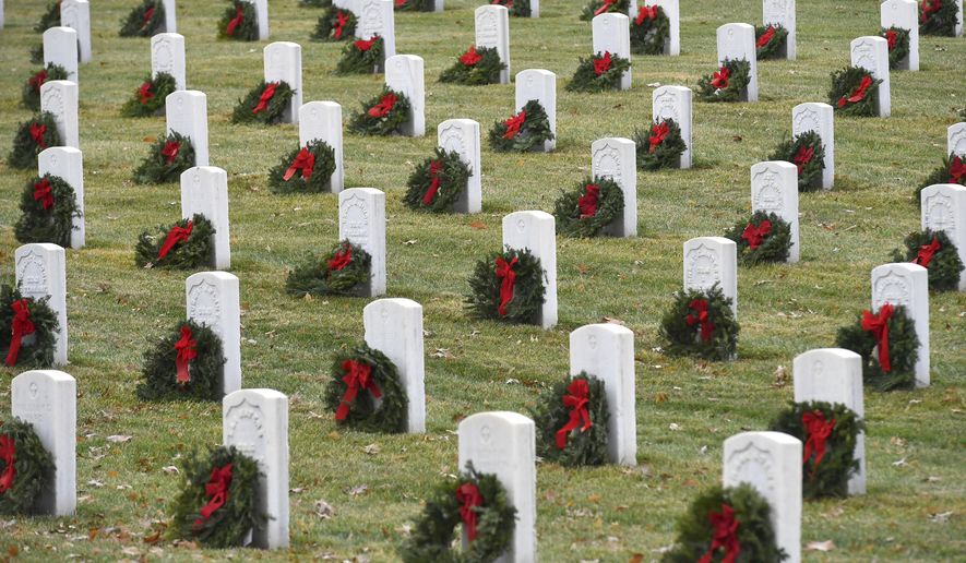 Wreaths were placed at the Veterans Cemetery at Mountain Home in Johnson City, Tenn., during the annual Wreaths Across American event on Saturday, Dec. 18, 2021. (David Crigger /Bristol Herald Courier via AP)
