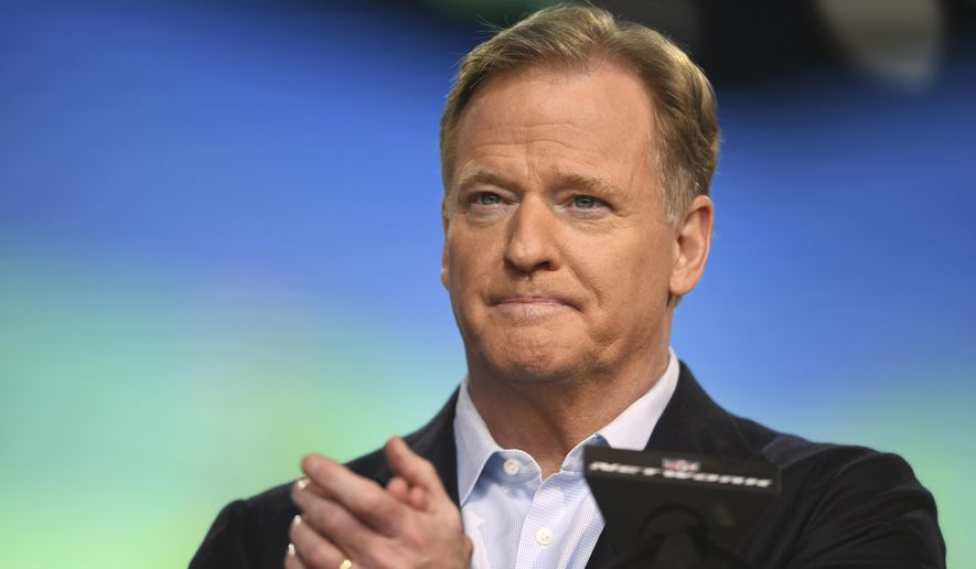 In this file photo, NFL Commissioner Roger Goodell announces the start of the second round of the NFL football draft, Friday, April 30, 2021, in Cleveland. Only unvaccinated players and those experiencing possible symptoms of COVID-19 will be tested, starting Sunday, Dec. 19, under the NFL’s revised protocols.(AP Photo/David Dermer, File)  **FILE**