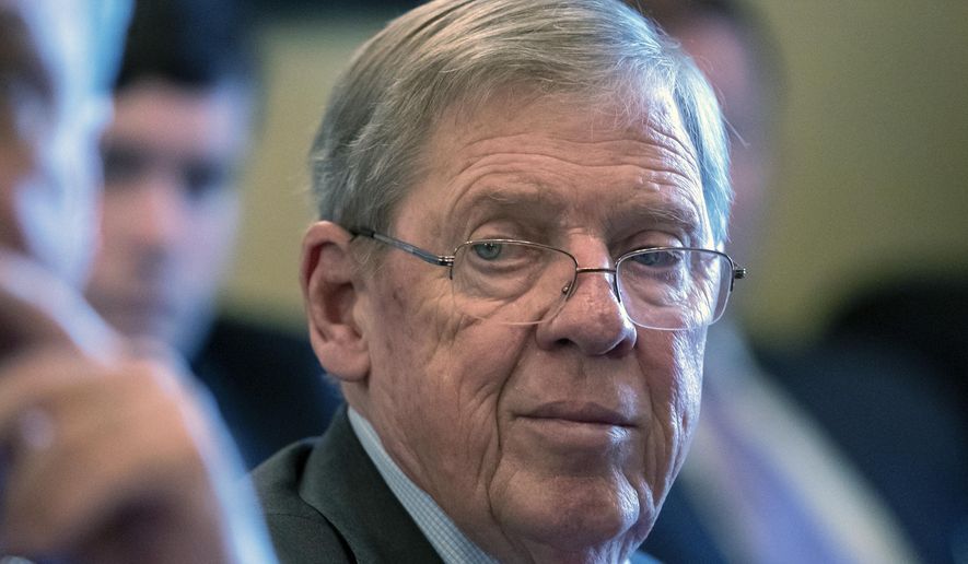 FILE - In this Feb. 14, 2019 photo, Sen. Johnny Isakson, R-Ga., leads a meeting on Capitol Hill in Washington. Isakson, an affable Georgia Republican politician who rose from the ranks of the state Legislature to become a U.S. senator, has died. He was 76. Georgia Gov. Brian Kemp’s office confirmed the death in a news release Sunday, Dec. 19, 2021. (AP Photo/J. Scott Applewhite, File)