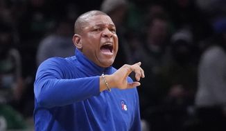 Philadelphia 76ers head coach Doc Rivers calls to his players during the first half of an NBA basketball game against the Boston Celtics, Monday, Dec. 20, 2021, in Boston. (AP Photo/Charles Krupa) **FILE**