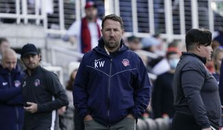 Washington Spirit head coach Kris Ward, center left, stands pitch side during the second half of the NWSL Championship soccer match against Chicago Red Stars Saturday, Nov. 20, 2021, in Louisville, Kentucky. (AP Photo/Jeff Dean) ** FILE**