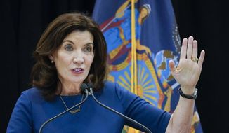 New York Gov. Kathy Hochul speaks at an event, Friday, Dec. 10, 2021, in New York. Gov. Kathy Hochul wants New York to impose term limits on her office and other statewide elected officials and ban them from earning an outside income, changes that implicitly rebuke her predecessor Andrew Cuomo. (AP Photo/Mary Altaffer, File)