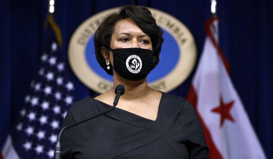 District of Columbia Mayor Muriel Bowser wears a face mask, as she speaks at a news conference on the coronavirus and the District&#x27;s response, July 13, 2020, in Washington. (AP Photo/Patrick Semansky) **FILE**