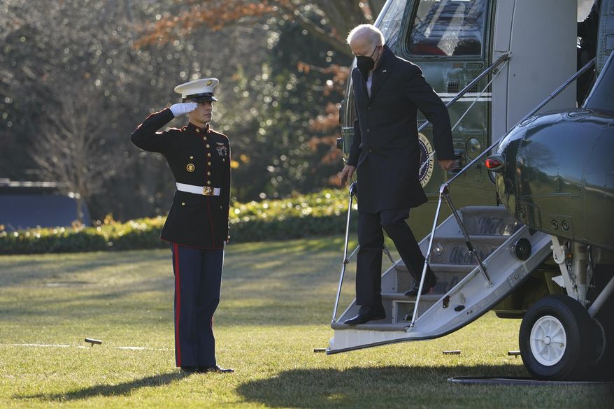 President Joe Biden steps off Marine One on the South Lawn of the White House in Washington, Monday, Dec. 20, 2021. Biden is returning to Washington after spending the weekend at his home in Delaware. (AP Photo/Patrick Semansky) ** FILE **