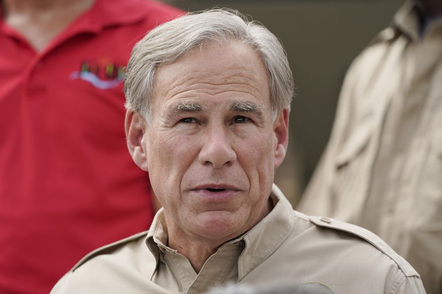 FILE - Texas Gov. Greg Abbott speaks during a news conference along the Rio Grande, Tuesday, Sept. 21, 2021, in Del Rio, Texas. Political observers are watching whether Abbott will posthumously pardon George Floyd for a 2004 arrest before the end of the year. (AP Photo/Julio Cortez, File)
