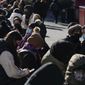 People wait in a long line to get tested for COVID-19 in Times Square, New York, Monday, Dec. 20, 2021. Just a couple of weeks ago, New York City seemed like a relative bright spot in the U.S. coronavirus struggle. Now it&#39;s a hot spot, confronting a dizzying spike in cases, a scramble for testing, a quandary over a major event and an exhausting sense of déjà vu. (AP Photo/Seth Wenig)