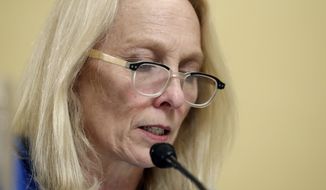 Rep. Mary Gay Scanlon, D-Pa., speaks during a House Rules Committee hearing on the impeachment against President Donald Trump, Tuesday, Dec. 17, 2019, on Capitol Hill in Washington. (AP Photo/Julio Cortez, Pool)