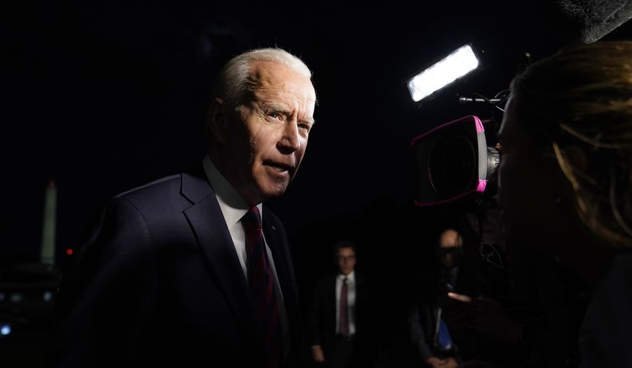 President Joe Biden speaks to reporters on the South Lawn of the White House in Washington after returning from a trip to Cincinnati, on July 21, 2021. (AP Photo/Susan Walsh)