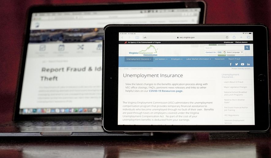 Web pages used to show information for collecting unemployment insurance in Virginia, right, and reporting fraud and identity theft in Pennsylvania, are displayed on the respective state web pages, on Feb. 26, 2021, in Zelienople, Pa. The Secret Service said it has seized more than $1.2 billion while investigating unemployment insurance and loan fraud and has returned more than $2.3 billion of fraudulently obtained funds by working with financial partners and states to reverse transactions.  (AP Photo/Keith Srakocic, File)