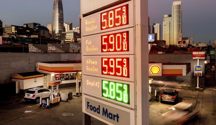 A marquee displays gas prices at a Shell station on Nov. 22, 2021, in San Francisco. Rising prices for oil and natural gas unsettled the global economic recovery in 2021. (AP Photo/Noah Berger, File)