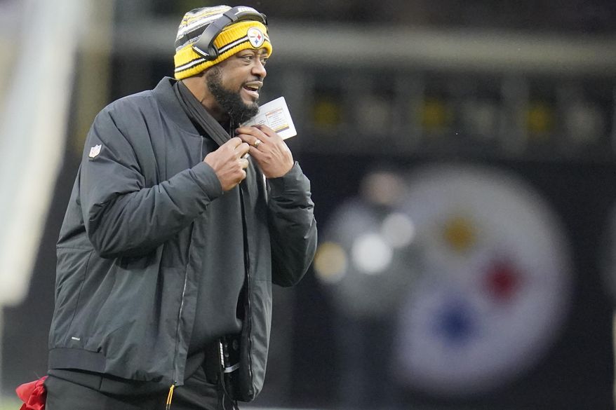 Pittsburgh Steelers head coach Mike Tomlin smiles as his team plays against the Tennessee Titans during the second half of an NFL football game, Sunday, Dec. 19, 2021, in Pittsburgh. (AP Photo/Gene J. Puskar)