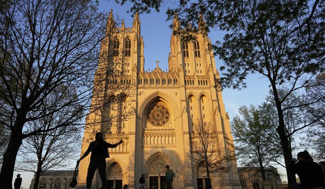 This Tuesday, April 13, 2021, file photo shows the Washington National Cathedral in Washington, D.C., at sunset. (AP Photo/Carolyn Kaster) ** FILE **