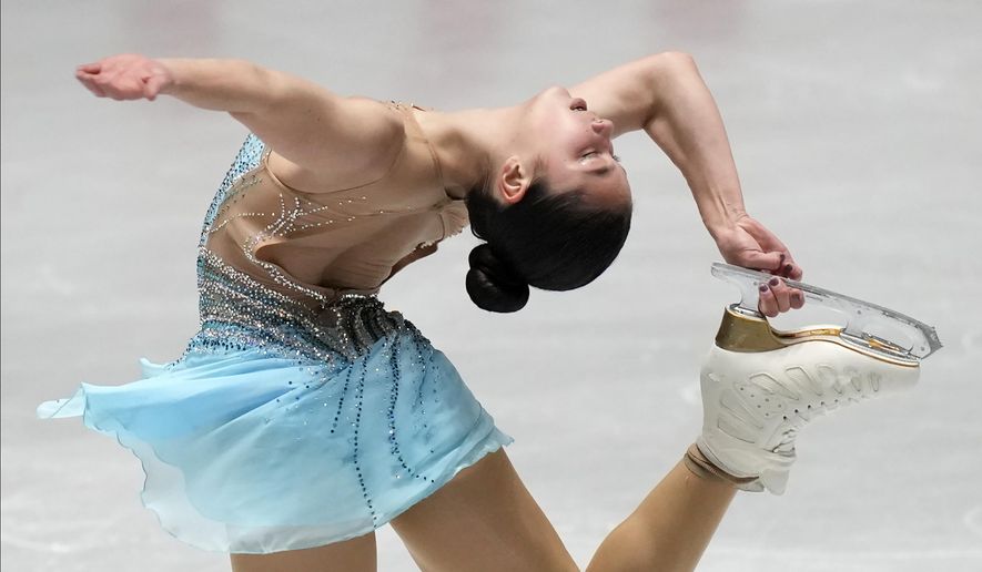 Alysa Liu, of the United States, performs during the women&#39;s free skating at the ISU Grand Prix of Figure Skating NHK Trophy competition in Tokyo, Japan, Nov. 13, 2021. As U.S. skaters, led by three-time world champion Nathan Chen, two-time U.S. champion Liu, and outstanding ice dance couples Madison Hubbell and Zach Donohue, and Madison Chock and Evan Bates, prepare for nationals during the first week in Jan. 2022, in Nashville, they need to be aware of the pressure ahead. (AP Photo/Shuji Kajiyama, File). **FILE**