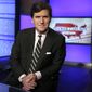 Fox News has marked its 25th anniversary by dominating the overall cable world for the sixth year in a row according to Nielsen. Fox News averaged 2.4 million primetime viewers compared to CNN which drew 1.1 million and MSNBC with 1.6 million. “Tucker Carlson Tonight” finished 2021 as the highest-rated program in cable news, averaging 3.2 million viewers. . (AP Photo/Richard Drew, File)