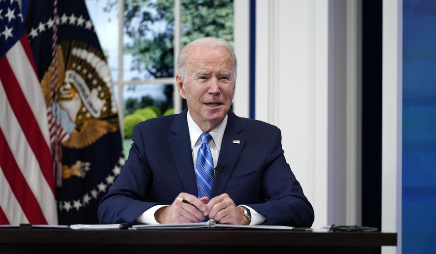 President Joe Biden participates in the White House COVID-19 Response Team&#x27;s regular call with the National Governors Association in the South Court Auditorium in the Eisenhower Executive Office Building on the White House Campus, Monday, Dec. 27, 2021, in Washington. (AP Photo/Carolyn Kaster)