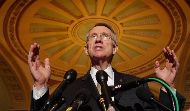 FILE -  Senate Majority Leader Harry Reid of Nev., gestures during a news conference on Capitol Hill in Washington, on June 26, 2007. Reid, the former Senate majority leader and Nevada’s longest-serving member of Congress, has died. He was 82. (AP Photo/Dennis Cook, File)
