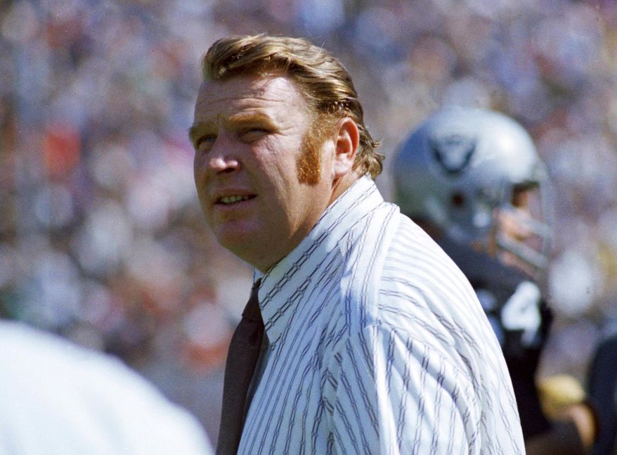 FILE - Oakland Raiders coach John Madden stands on the sideline during an NFL football game in October 1978. Madden, the Hall of Fame coach turned broadcaster whose exuberant calls combined with simple explanations provided a weekly soundtrack to NFL games for three decades, died Tuesday morning, Dec. 28, 2021, the league said. He was 85. The NFL said he died unexpectedly and did not detail a cause. (AP Photo, File)