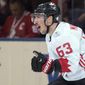 Canada&#39;s Brad Marchand (63) celebrates his goal against Europe during the third period of Game 2 of the World Cup of Hockey finals, in Toronto on Thursday, Sept. 29, 2016.  A handful of NHL players are voicing frustration over the decision not to allow them to go to the upcoming Winter Olympics in Beijing. Marchand ripped the league and NHLPA on social media Tuesday, Dec. 28, 2021 for adding taxi squads to keep the season going but not in February to give players the option to leave for the Olympics. (Frank Gunn/The Canadian Press via AP, File). **FILE**