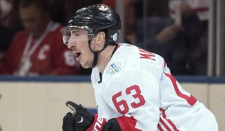 Canada&#39;s Brad Marchand (63) celebrates his goal against Europe during the third period of Game 2 of the World Cup of Hockey finals, in Toronto on Thursday, Sept. 29, 2016.  A handful of NHL players are voicing frustration over the decision not to allow them to go to the upcoming Winter Olympics in Beijing. Marchand ripped the league and NHLPA on social media Tuesday, Dec. 28, 2021 for adding taxi squads to keep the season going but not in February to give players the option to leave for the Olympics. (Frank Gunn/The Canadian Press via AP, File). **FILE**