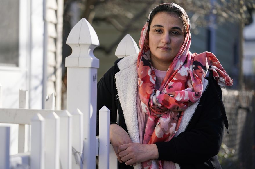 Haseena Niazi, a 24-year-old from Afghanistan, poses outside her home, Friday, Dec. 17, 2021, north of Boston. Niazi received a letter from the federal government denying her fiancé&#39;s humanitarian parole application earlier in the month. Her fiance, who she asked not to be named over concerns about his safety, had received threats from Taliban members for working on women&#39;s health issues at a hospital north of Kabul. (AP Photo/Charles Krupa)