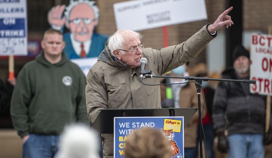 U.S. Sen. Bernie Sanders, I-Vt., speaks at a rally with striking Kellogg workers at Festival Market Square in downtown Battle Creek, Mich., on Friday, Dec. 17, 2021. Kellogg&#39;s reached a new tentative agreement this week with its 1,400 striking cereal plant workers that could bring an end to the strike that began Oct. 5. The results of the contract vote are expected to be released next week. (Alyssa Keown/Battle Creek Enquirer via AP)
