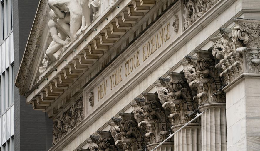 The New York Stock Exchange operates during normal business hours in the Financial District, Wednesday, Oct. 13, 2021, in New York. Stocks are inching higher in early trading Friday, Dec. 31, the final day of what turned out to be another big year on Wall Street. (AP Photo/John Minchillo, File)