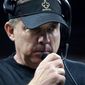 New Orleans Saints head coach Sean Payton talks on the sideline in the first half of an NFL football game against the Carolina Panthers in New Orleans, Sunday, Jan. 2, 2022. (AP Photo/Gerald Herbert)