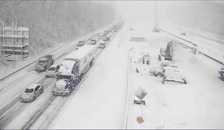 This image provided by the Virginia department of Transportation shows a closed section of Interstate 95 near Fredericksburg, Va. Monday Jan. 3, 2022. Both northbound and southbound sections of the highway were closed due to snow and ice. (Virginia Department of Transportation via AP)