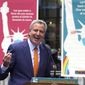 New York Mayor Bill de Blasio delivers his remarks in Times Square after he toured the grand opening of a Broadway COVID-19 vaccination site intended to jump-start the city&#39;s entertainment industry, in New York, April 12, 2021. (AP Photo/Richard Drew) **FILE**