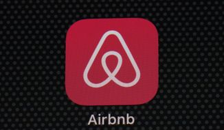 The Airbnb app icon is displayed on an iPad screen in Washington, D.C., on May 8, 2021. Airbnb hosts in Oregon will soon only see the initials of some prospective renters, not their full names, in a change designed to prevent discrimination against Black users of the online lodging marketplace.  (AP Photo/Patrick Semansky, File)