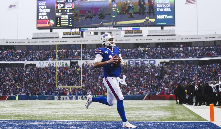 Buffalo Bills quarterback Josh Allen (17) rushes for a touchdown during the first half of an NFL football game against the Atlanta Falcons, Sunday, Jan. 2, 2022, in Orchard Park, N.Y. (AP Photo/Joshua Bessex)