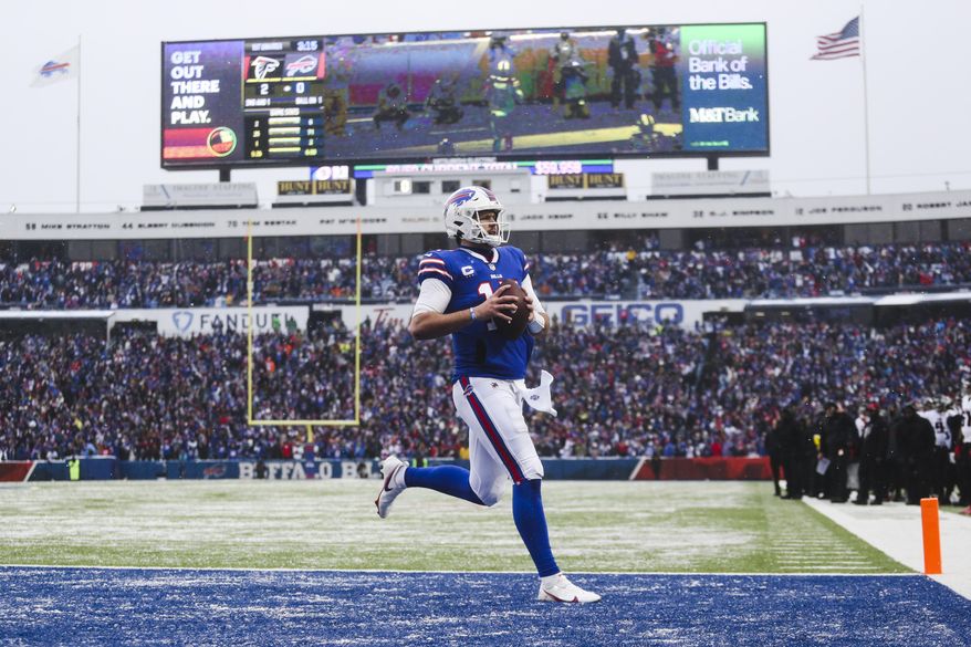 Buffalo Bills quarterback Josh Allen (17) rushes for a touchdown during the first half of an NFL football game against the Atlanta Falcons, Sunday, Jan. 2, 2022, in Orchard Park, N.Y. (AP Photo/Joshua Bessex)