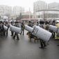Riot police gather to block demonstrators during a protest in Almaty, Kazakhstan, Wednesday, Jan. 5, 2022. Demonstrators denouncing the doubling of prices for liquefied gas have clashed with police in Kazakhstan&#39;s largest city and held protests in about a dozen other cities in the country. (AP Photo/Vladimir Tretyakov)