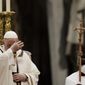 Pope Francis celebrates an Epiphany mass in St. Peter&#39;s Basilica, at the Vatican, Thursday, Jan. 6, 2022. (AP Photo/Gregorio Borgia)