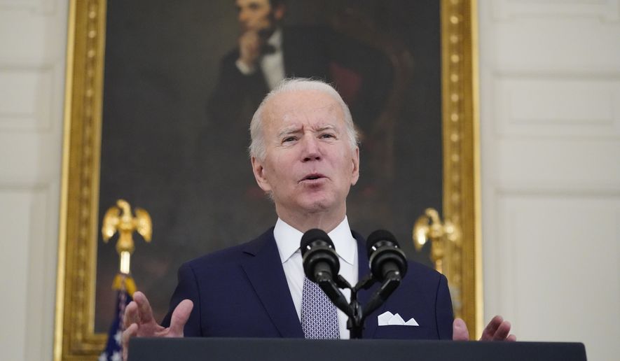 President Joe Biden speaks about the 2021 jobs report in the State Dining Room of the White House, Friday, Jan. 7, 2022, in Washington. (AP Photo/Alex Brandon)