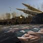 Posters of Iranian Gen. Qassem Soleimani, who was killed in Iraq in a U.S. drone attack in Jan. 3, 2020, are seen in front of Qiam, background left, Zolfaghar, top right, and Dezful missiles displayed in a missile capabilities exhibition by the paramilitary Revolutionary Guard a day prior to second anniversary of Iran&#39;s missile strike on U.S. bases in Iraq in retaliation for killing Gen. Soleimani, at Imam Khomeini grand mosque, in Tehran, Iran, Friday, Jan. 7, 2022. Iran put three ballistic missiles on display on Friday, as talks in Vienna aimed at reviving Tehran&#39;s nuclear deal with world powers flounder. (AP Photo/Vahid Salemi) **FILE**