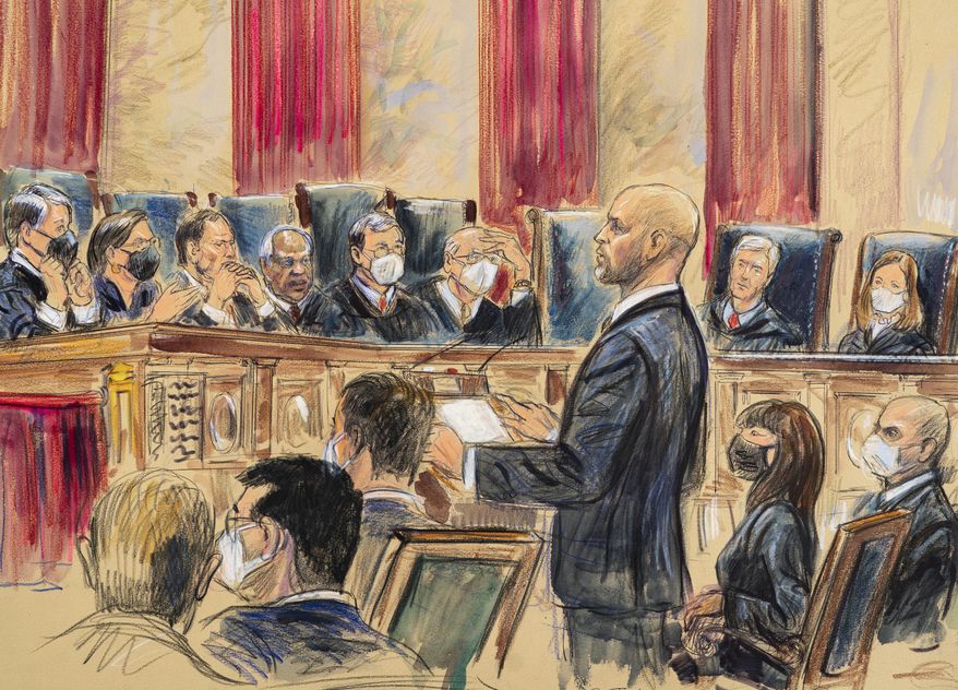 This artist sketch depicts lawyer Scott Keller standing to argue on behalf of more than two dozen business groups seeking an immediate order from the Supreme Court to halt a Biden administration order to impose a vaccine-or-testing requirement on the nation&#39;s large employers during the COVID-19 pandemic, at the Supreme Court in Washington, Friday, Jan. 7, 2022. Solicitor General Elizabeth Prelogar, the Biden administration&#39;s top Supreme Court lawyer, is seated at right. (Dana Verkouteren via AP)