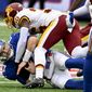 New York Giants quarterback Jake Fromm (17) is sacked by Washington Football Team cornerback Danny Johnson during the first quarter of an NFL football game, Saturday, Jan. 9, 2021, in East Rutherford, N.J. (AP Photo/Bill Kostroun)