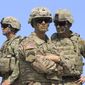U.S. soldiers take part in NATO-led Noble Partner 2017 multinational military exercises at the military base of Vaziani, outside Tbilisi, Georgia, Aug. 9, 2017. While Ukraine and Georgia aren&#x27;t yet ready for NATO membership and have little prospect of being invited to join soon, the Western allies insist that NATO&#x27;s doors must remain open to them. In 2008, NATO promised to eventually embrace the two nations, although it hasn&#x27;t offered them a specific roadmap to membership. (AP Photo/Shakh Aivazov, File)