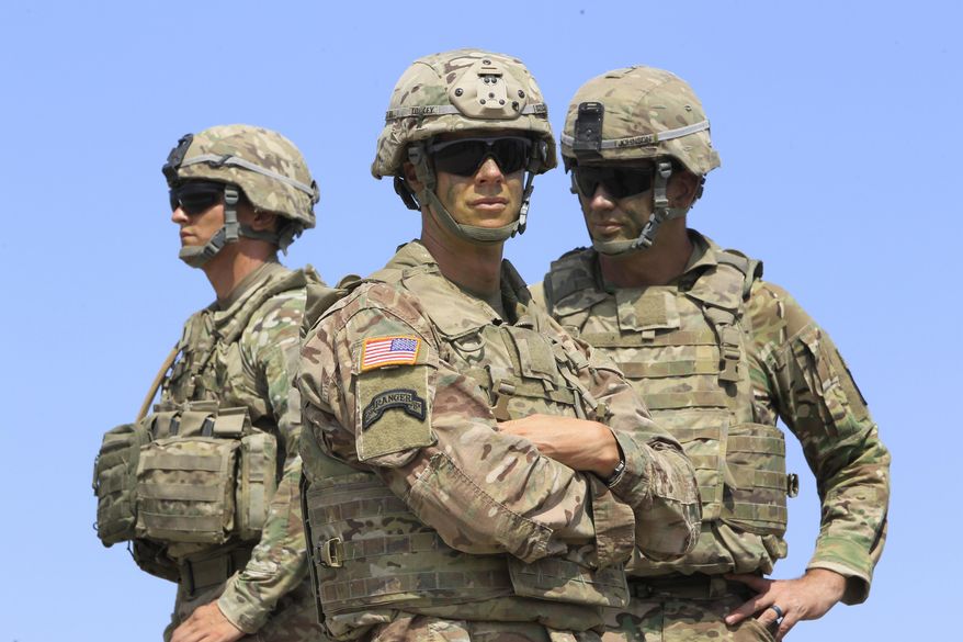 U.S. soldiers take part in NATO-led Noble Partner 2017 multinational military exercises at the military base of Vaziani, outside Tbilisi, Georgia, Aug. 9, 2017. While Ukraine and Georgia aren&#39;t yet ready for NATO membership and have little prospect of being invited to join soon, the Western allies insist that NATO&#39;s doors must remain open to them. In 2008, NATO promised to eventually embrace the two nations, although it hasn&#39;t offered them a specific roadmap to membership. (AP Photo/Shakh Aivazov, File)