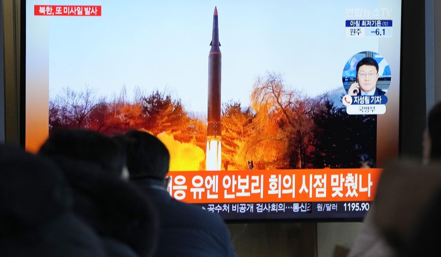 People watch a TV showing a file image of North Korea&#39;s missile launch during a news program at the Seoul Railway Station in Seoul, South Korea, Tuesday, Jan. 11, 2022. North Korea on Tuesday fired what appeared to be a ballistic missile into its eastern sea, its second weapons launch in a week, the militaries of South Korea and Japan said. The Korean letters read &amp;quot;UN Security Council meeting.&amp;quot; (AP Photo/Ahn Young-joon)