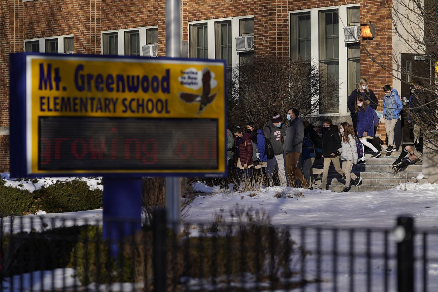 Chicago classrooms to reopen Wednesday after a bitter feud over remote learning in virus surge