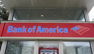 A Bank of America ATM is seen, Wednesday, Feb. 3, 2021, in Winchester, Mass. (AP Photo/Elise Amendola) ** FILE **