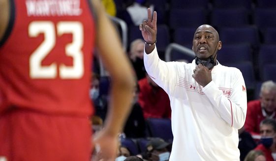 Maryland interim head coach Danny Manning signals to his team during the first half of an NCAA college basketball game against Northwestern in Evanston, Ill., Wednesday, Jan. 12, 2022. (AP Photo/Nam Y. Huh) ** FILE**