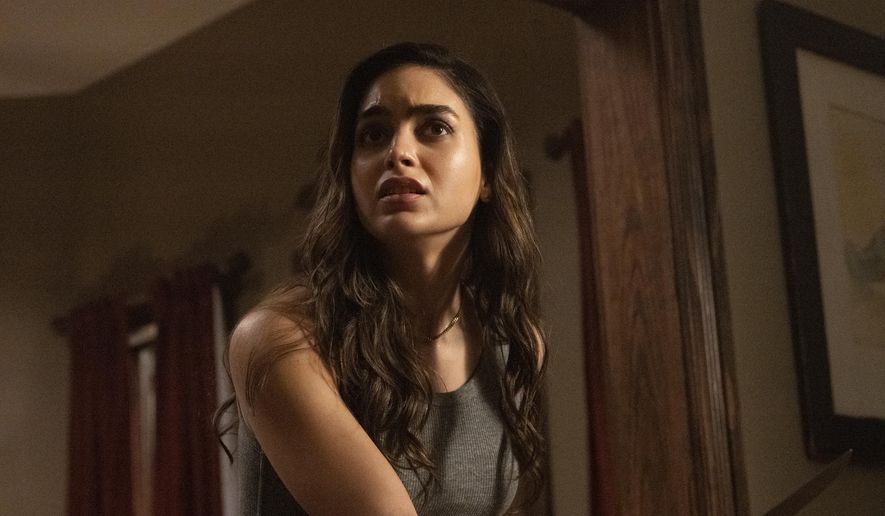This image released by Paramount Pictures shows Melissa Barrera in a scene from "Scream." (Brownie Harris/Paramount Pictures via AP)