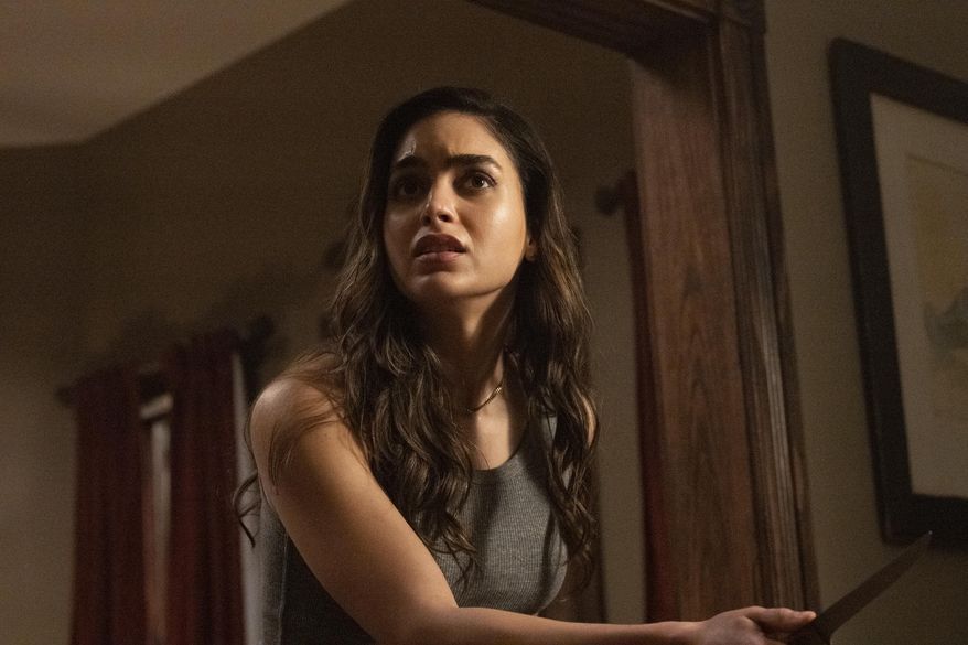 This image released by Paramount Pictures shows Melissa Barrera in a scene from "Scream." (Brownie Harris/Paramount Pictures via AP)