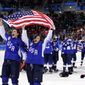 FILE - United States players celebrate after winning the women&#39;s gold medal hockey game against Canada at the 2018 Winter Olympics in Gangneung, South Korea, Feb. 22, 2018. The United States is the defending Olympic champion after beating Canada in an exceptionally nail-biting 3-2 shootout win at South Korea to end Canada&#39;s run of four gold medals. (AP Photo/Frank Franklin II, File)