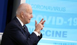 President Joe Biden speaks about the government&#39;s COVID-19 response, in the South Court Auditorium in the Eisenhower Executive Office Building on the White House Campus in Washington, Thursday, Jan. 13, 2022. (AP Photo/Andrew Harnik)